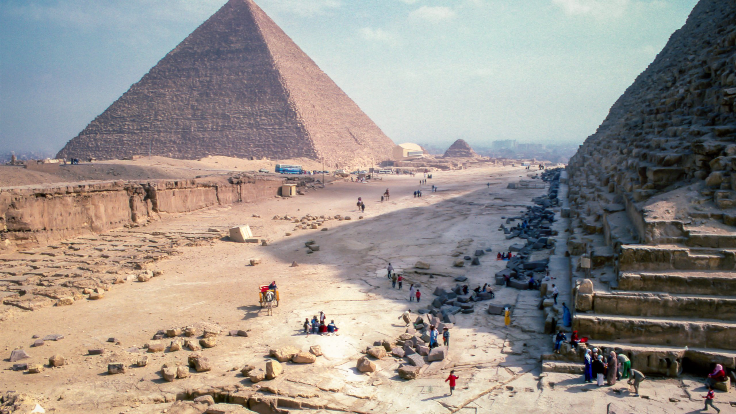 The Great Pyramid of Khufu rising above the Giza plateau, seen from beside the Pyramid of Khafre, Egypt
