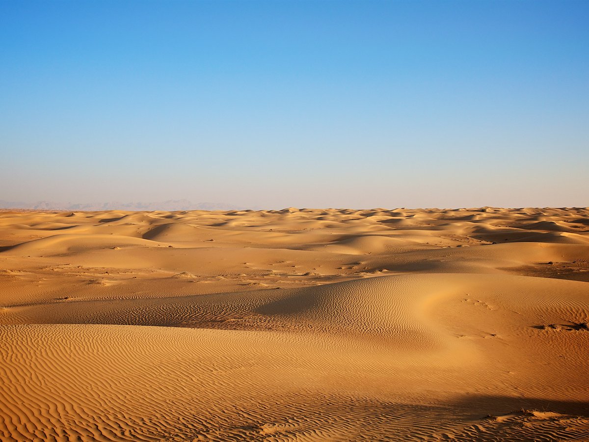 Red sand dunes in the desert outside Dubai