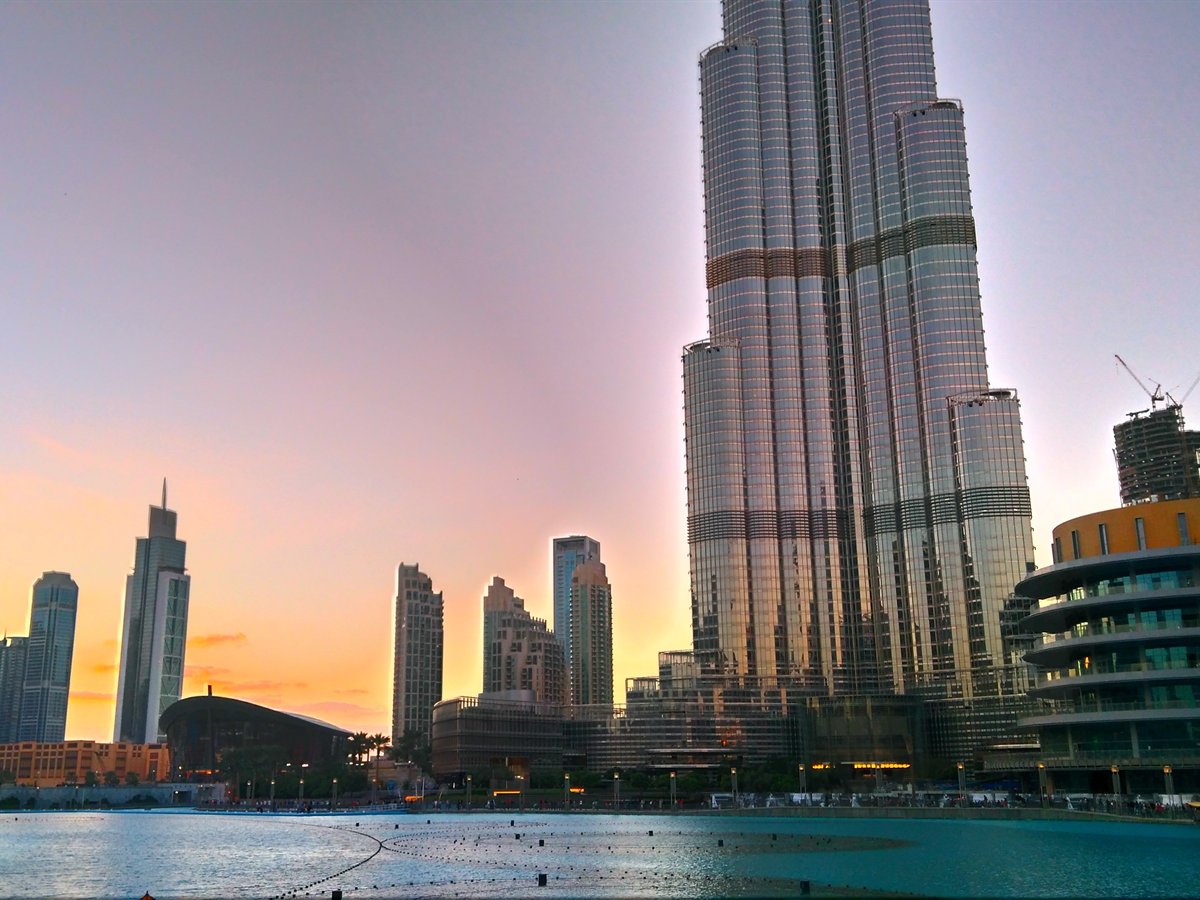 The Burj Khalifa rising above the Dubai Fountain lake