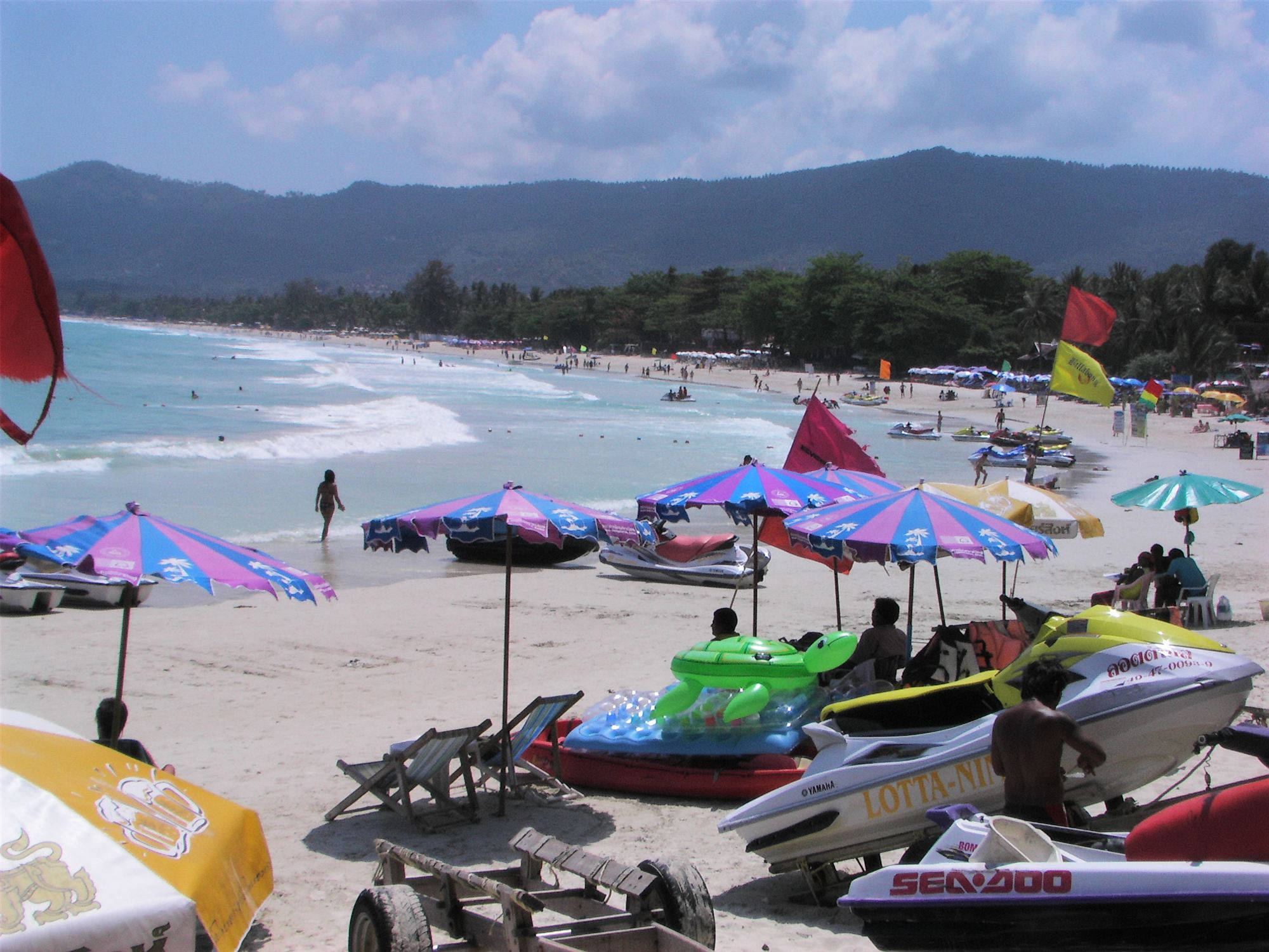 Chaweng Beach on Koh Samui, Thailand, with its long curve of sand and hills behind