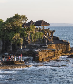 Tanah Lot temple on a sea rock at sunset, Bali, Indonesia