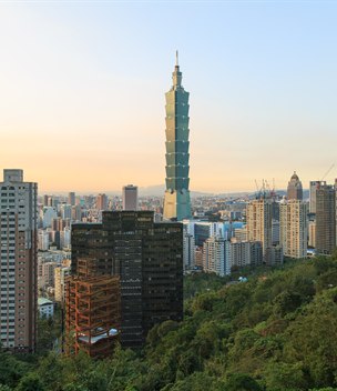 Taipei 101 tower above the city at golden hour, Taiwan